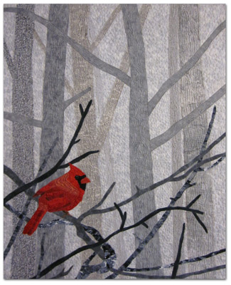 Image - red cardinal against gray trees