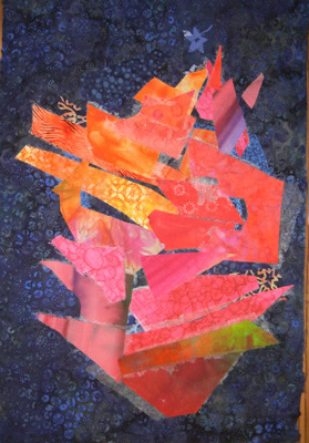 Image - colorful scraps arranged against blue fabric