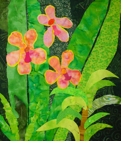 Image - orange orchids against green leaves