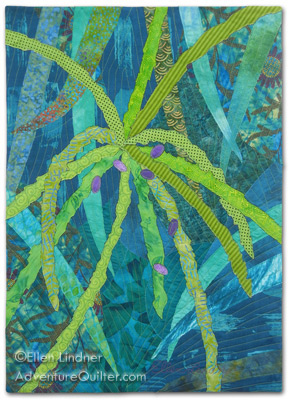 Image - blue-green plam fronds with yellow-green nubby twigs