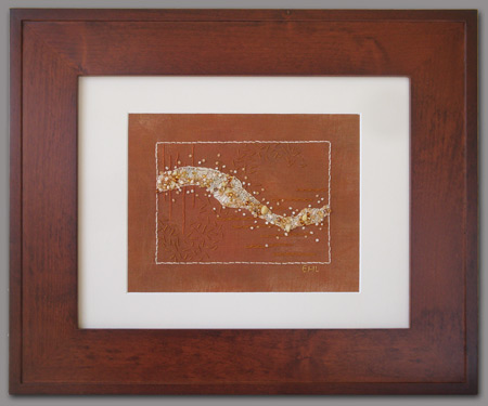 Image - cream stitching and beads on rust linen