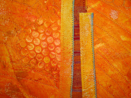 Image - orange fabrics with textured details