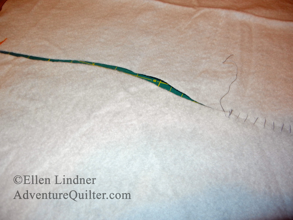 Ellen Lindner shows how to sew batting pieces together.  AdventureQuilter.com/blog