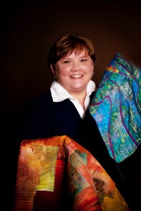 2010 head shot with 2 quilts-med