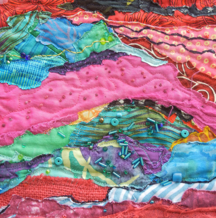 Red Strata - detail, an art quilt by Ellen Lindner. AdventureQuilter.com