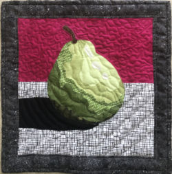 3D looking pear made in Ellen Lindner's Double Reverse Applique class. AdventureQuilter.com