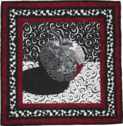 Made using Ellen Lindner's Double Reverse Applique technique. AdventureQuilter.com