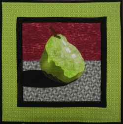 Made using Ellen Lindner's Double Reverse Applique technique. AdventureQuilter.com