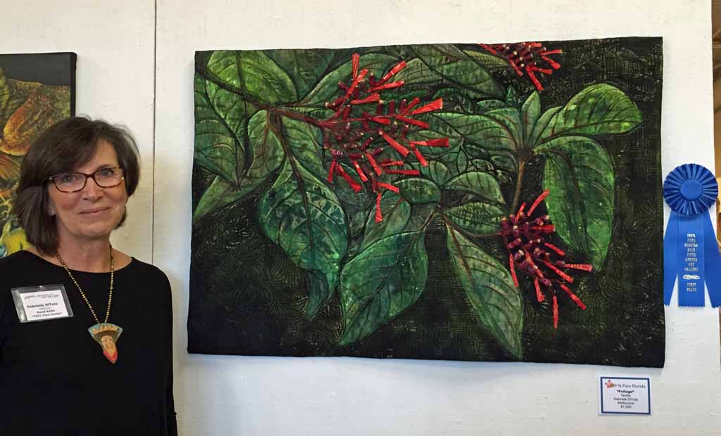 Gabrield DiTota at 100% Pure Florida 2016 exhibit. Ellen Lindner, AdventureQuilter.com/blog