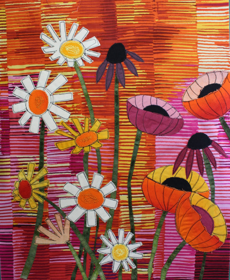 Student results from Ellen Lindner's "Floral Improv" class. AdventureQuilter.com