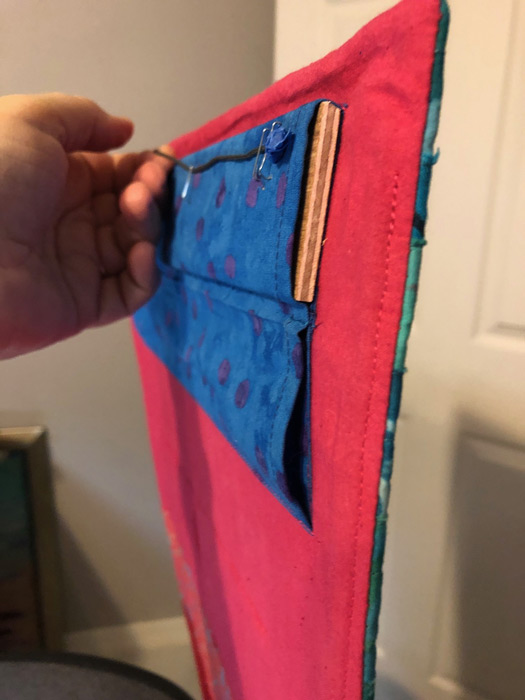 Hanging on a Single Nail. Ellen Lindner, AdventureQuilter.com/blog