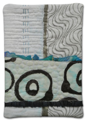 A tiny little fabric collage by Ellen Lindner. AdventureQuilter.com