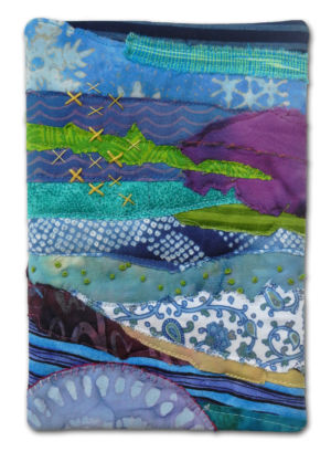 A tiny little fabric collage by Ellen Lindner. AdventureQuilter.com