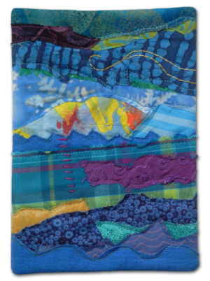 A tiny little fabric collage by Ellen Lindner. AdventureQuilter.com