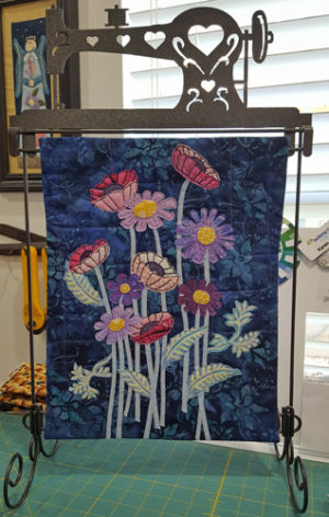 Student's results in Ellen Lindner's "Floral Improv" class. AdventureQuilter.com
