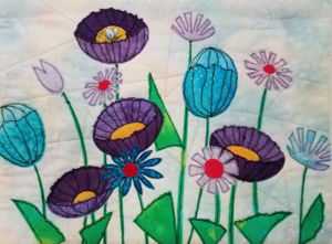 Student work from Ellen Lindner's "Floral Improv" class. AdventureQuilter.com