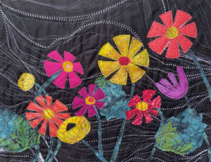 Student results from Ellen Lindner's "Floral Improv" class. AdventureQuilter.com