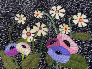 Student results from Ellen Lindner's "Floral Improv" class. AdventureQuilter.com